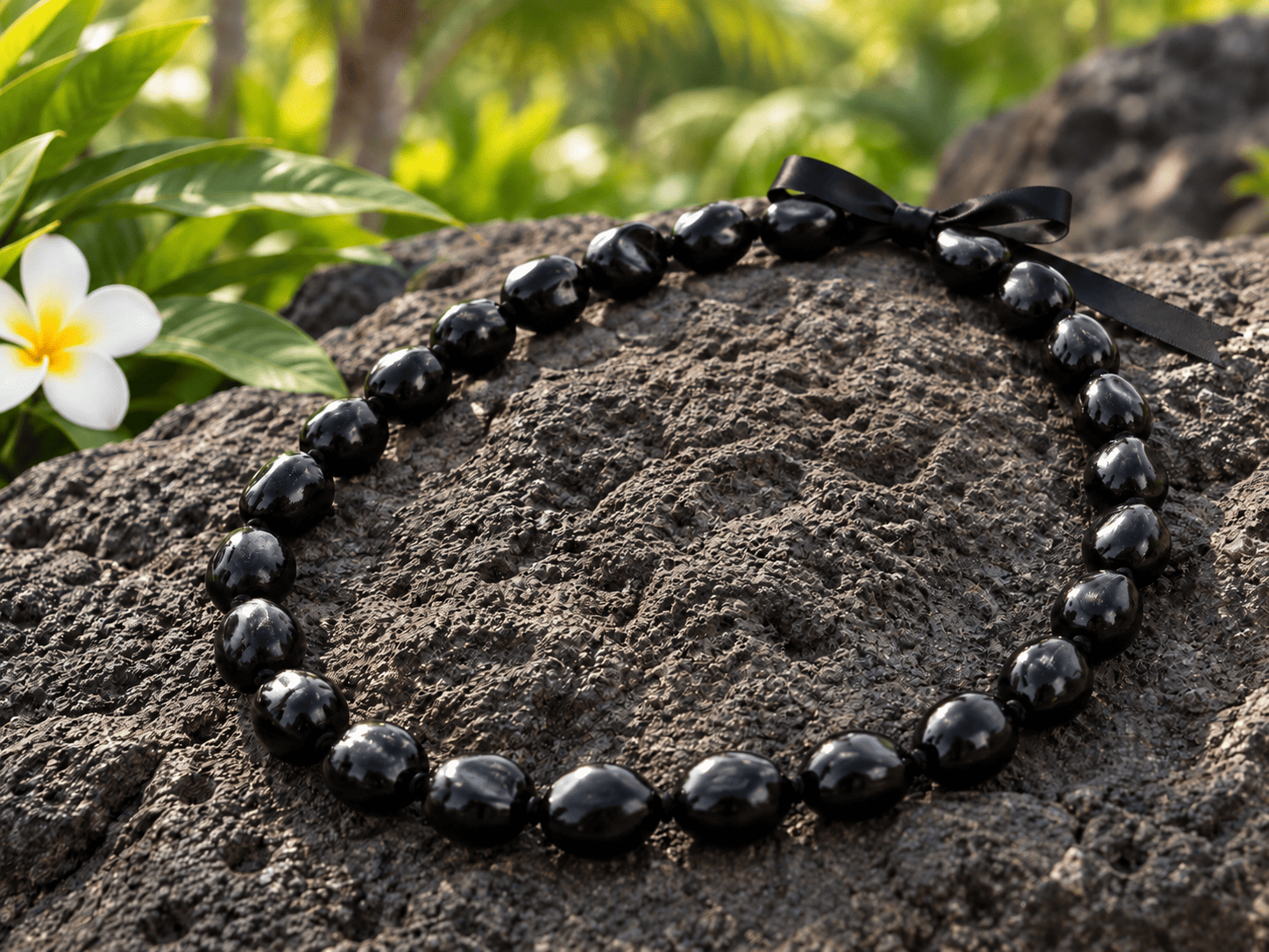 Kukui Nut Lei - a glossy long lasting lei made from traditional Hawaiian nuts (not edible).